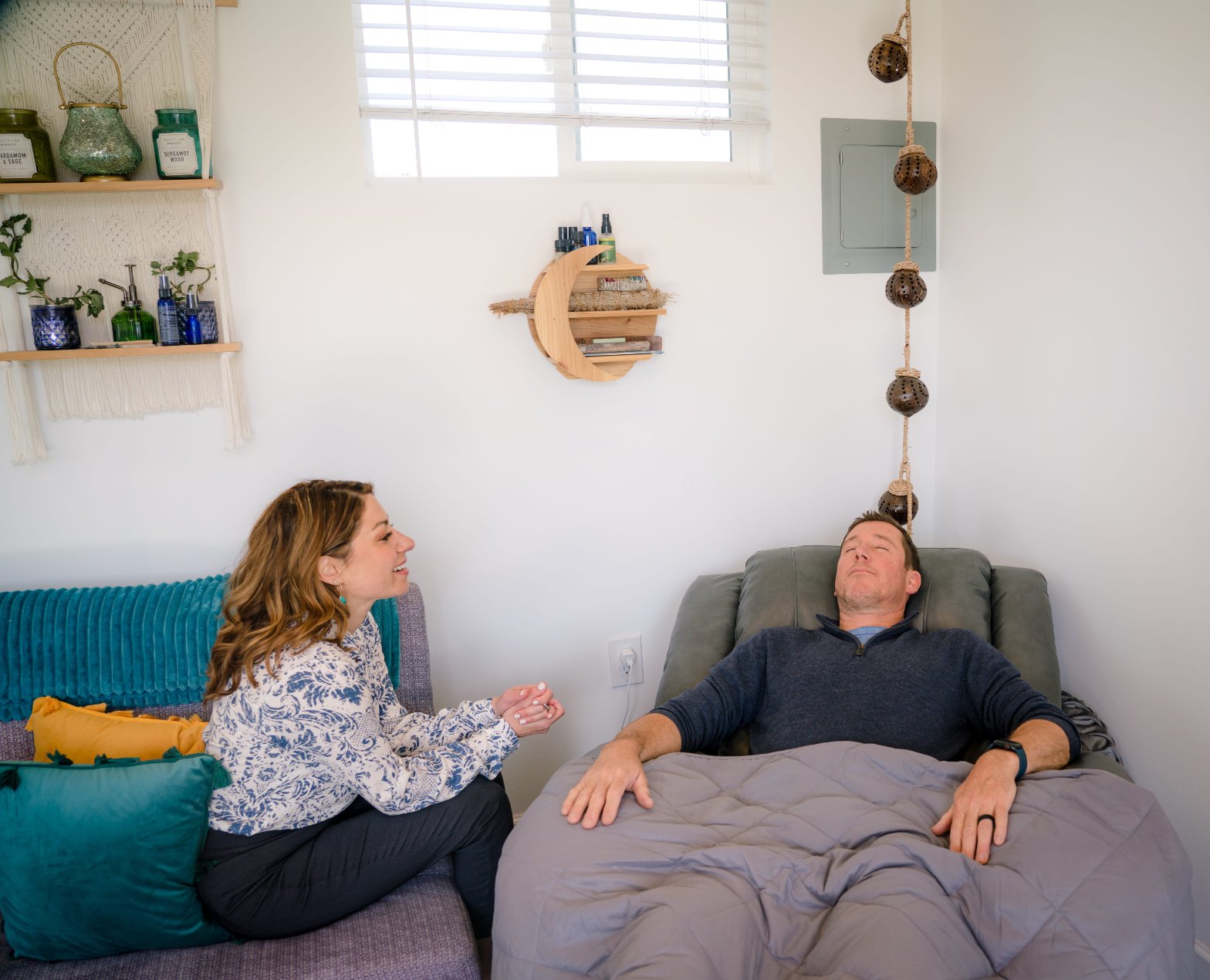 A client calm and at ease during a hypnotherapy session for anxiety relief